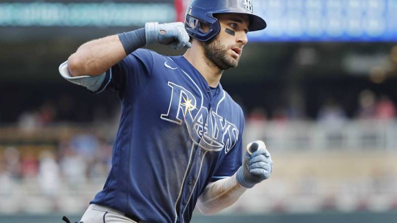 Jun 12, 2022; Minneapolis, Minnesota, USA; Tampa Bay Rays center fielder Kevin Kiermaier (39) runs the bases on his solo home run against the Minnesota Twins in the eighth inning at Target Field. Mandatory Credit: Bruce Kluckhohn-USA TODAY Sports