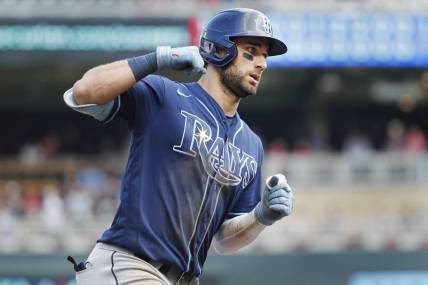 Jun 12, 2022; Minneapolis, Minnesota, USA; Tampa Bay Rays center fielder Kevin Kiermaier (39) runs the bases on his solo home run against the Minnesota Twins in the eighth inning at Target Field. Mandatory Credit: Bruce Kluckhohn-USA TODAY Sports