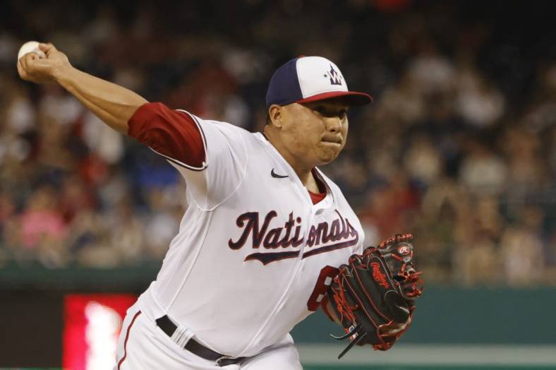 Jun 13, 2022; Washington, District of Columbia, USA; Washington Nationals starting pitcher Erasmo Ramirez (61) pitches against the Atlanta Braves during the first inning at Nationals Park. Mandatory Credit: Geoff Burke-USA TODAY Sports