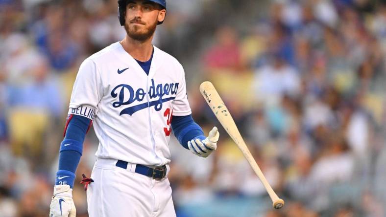 Jul 8, 2022; Los Angeles, California, USA;  Los Angeles Dodgers center fielder Cody Bellinger (35) reacts as he walks back to the dugout after striking out with bases loaded in the second inning against the Chicago Cubs at Dodger Stadium. Mandatory Credit: Jayne Kamin-Oncea-USA TODAY Sports