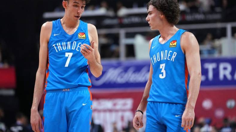 Jul 9, 2022; Las Vegas, NV, USA; Oklahoma City Thunder forward Chet Holmgren (7) talks to guard Josh Giddey (3) during an NBA Summer League game against the Houston Rockets at Thomas & Mack Center. Mandatory Credit: Stephen R. Sylvanie-USA TODAY Sports