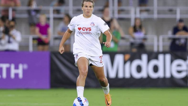 Aug 5, 2022; Louisville, Kentucky, USA; Washington Spirit defender Amber Brooks (22) controls the ball against Racing Louisville FC at Lynn Family Stadium. Mandatory Credit: Aaron Doster-USA TODAY Sports