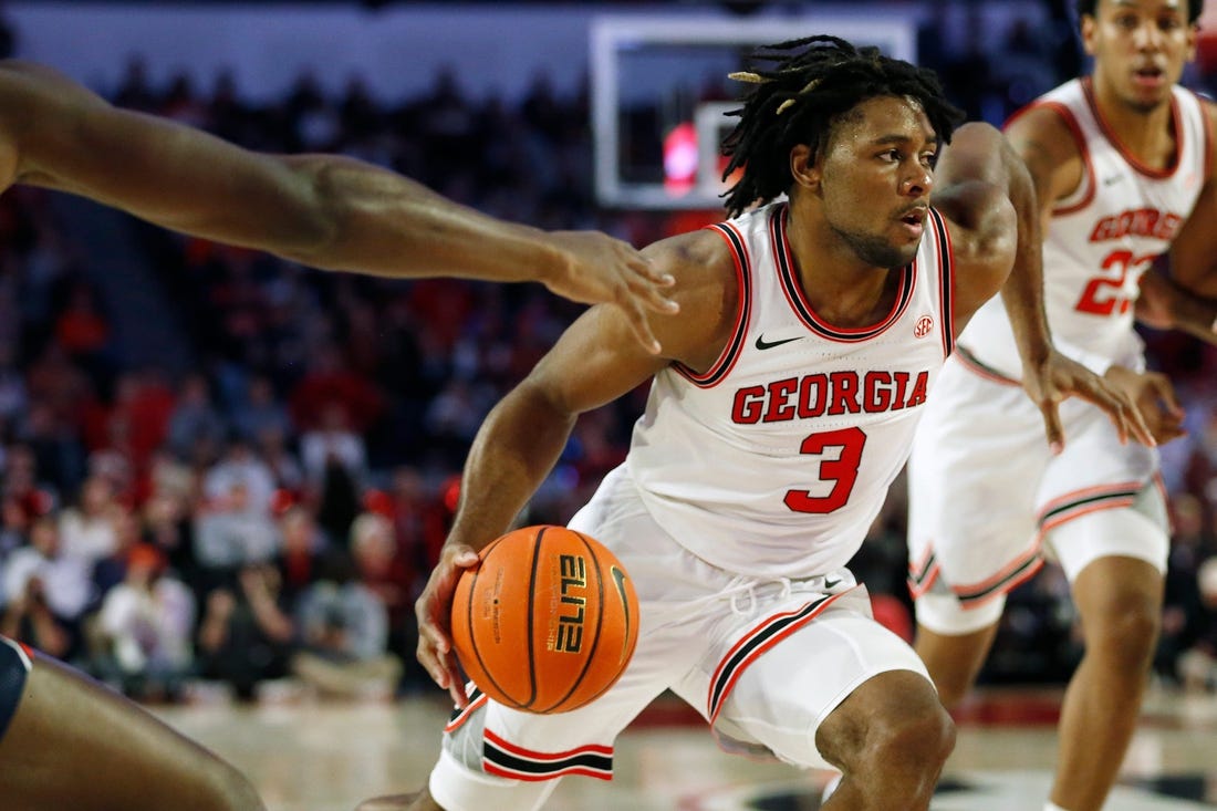 Feb. 5, 2022; Athens, Georgia, USA; Georgia Bulldogs guard Kario Oquendo (3) drives against the Auburn Tigers at Stegeman Coliseum. Joshua L. Jones/Athens Banner-Herald via USA TODAY NETWORK

Ncaa Basketball Auburn At Georgia