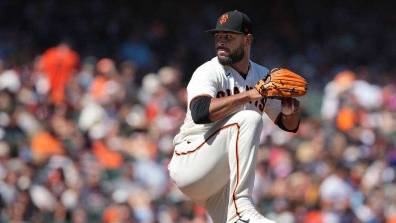 Aug 14, 2022; San Francisco, California, USA; San Francisco Giants relief pitcher Jarlin Garcia (66) throws a pitch against the Pittsburgh Pirates during the seventh inning at Oracle Park. Mandatory Credit: Darren Yamashita-USA TODAY Sports