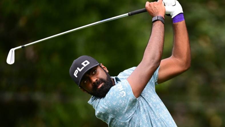 Aug 25, 2022; Atlanta, Georgia, USA; Sahith Theegala tees off on the 2nd hole during the first round of the TOUR Championship golf tournament. Mandatory Credit: Adam Hagy-USA TODAY Sports