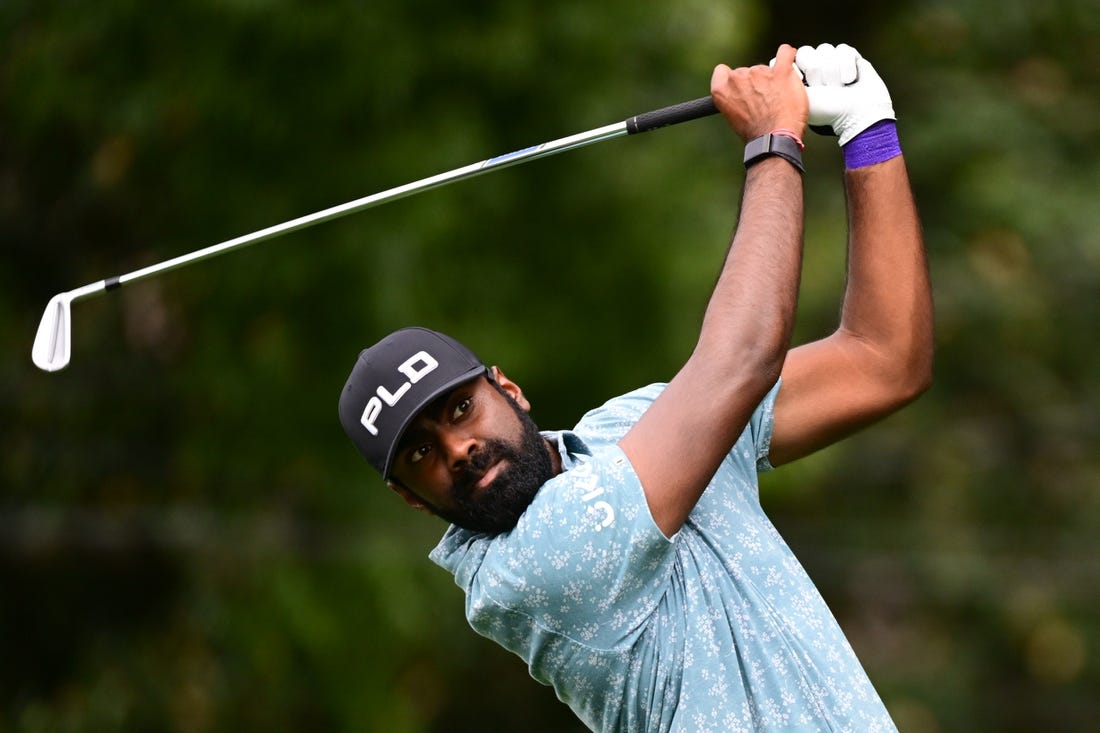 Aug 25, 2022; Atlanta, Georgia, USA; Sahith Theegala tees off on the 2nd hole during the first round of the TOUR Championship golf tournament. Mandatory Credit: Adam Hagy-USA TODAY Sports