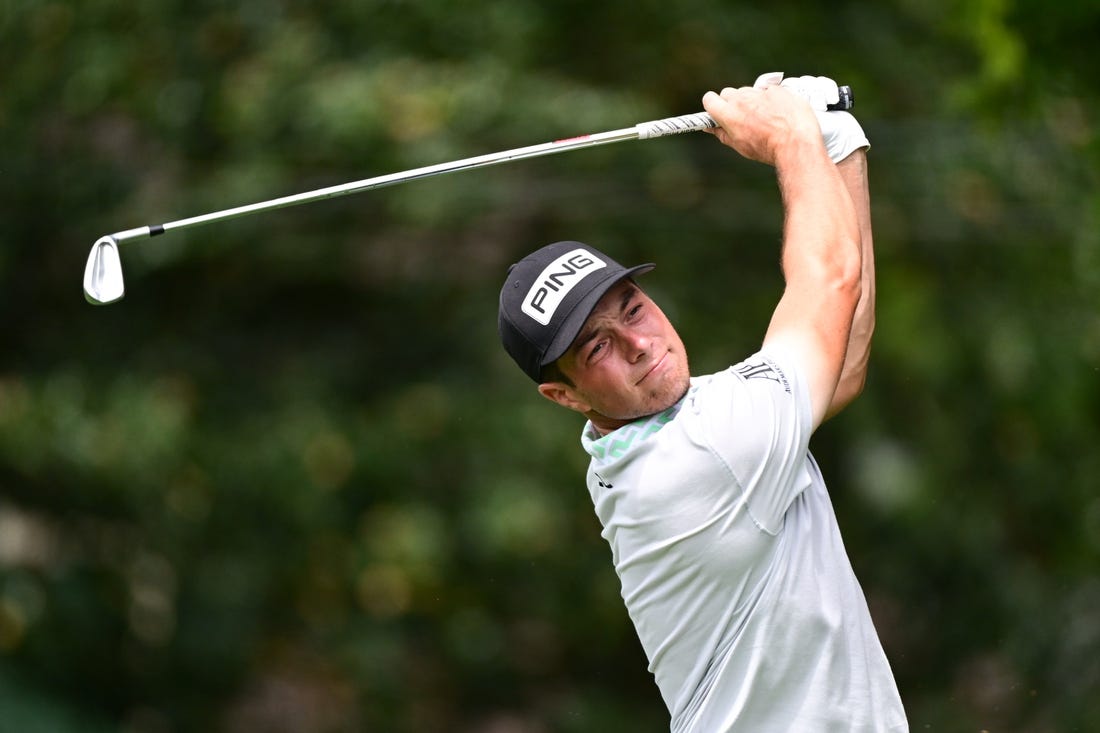 Aug 25, 2022; Atlanta, Georgia, USA; Viktor Hovland tees off on the 2nd hole during the first round of the TOUR Championship golf tournament. Mandatory Credit: Adam Hagy-USA TODAY Sports