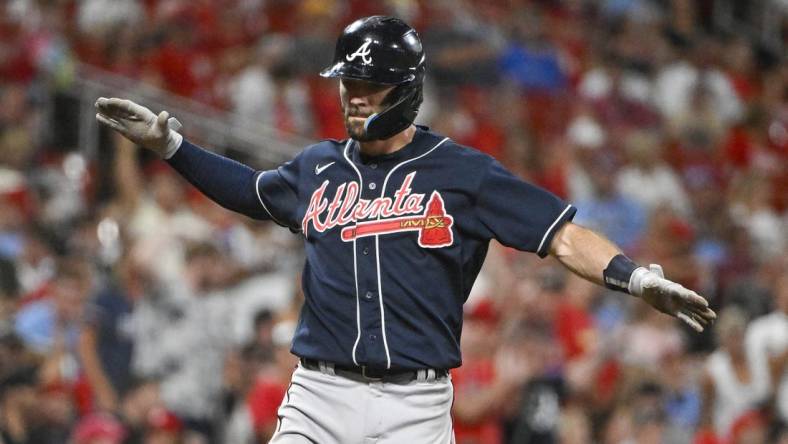 Aug 28, 2022; St. Louis, Missouri, USA;  Atlanta Braves shortstop Dansby Swanson (7) reacts after hitting a go ahead three run home run against the St. Louis Cardinals during the seventh inning at Busch Stadium. Mandatory Credit: Jeff Curry-USA TODAY Sports