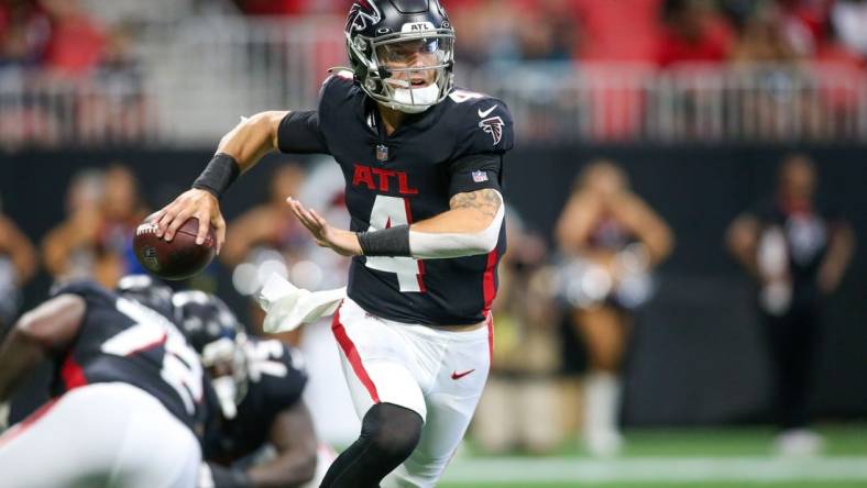 Aug 27, 2022; Atlanta, Georgia, USA; Atlanta Falcons quarterback Desmond Ridder (4) throws a pass against the Jacksonville Jaguars in the first half at Mercedes-Benz Stadium. Mandatory Credit: Brett Davis-USA TODAY Sports