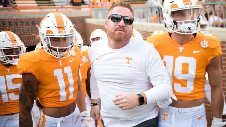 Tennessee Offensive Coordinator/Tight Ends coach Alex Golesh runs on the field before the Tennessee football season opener game against Ball State in Knoxville, Tenn. on Thursday, Sept. 1, 2022.

Kns Utvbs0901