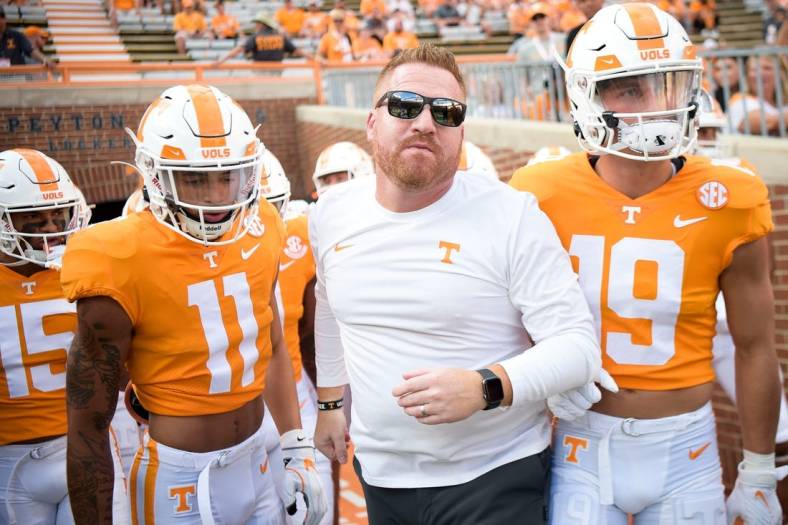 Tennessee Offensive Coordinator/Tight Ends coach Alex Golesh runs on the field before the Tennessee football season opener game against Ball State in Knoxville, Tenn. on Thursday, Sept. 1, 2022.

Kns Utvbs0901
