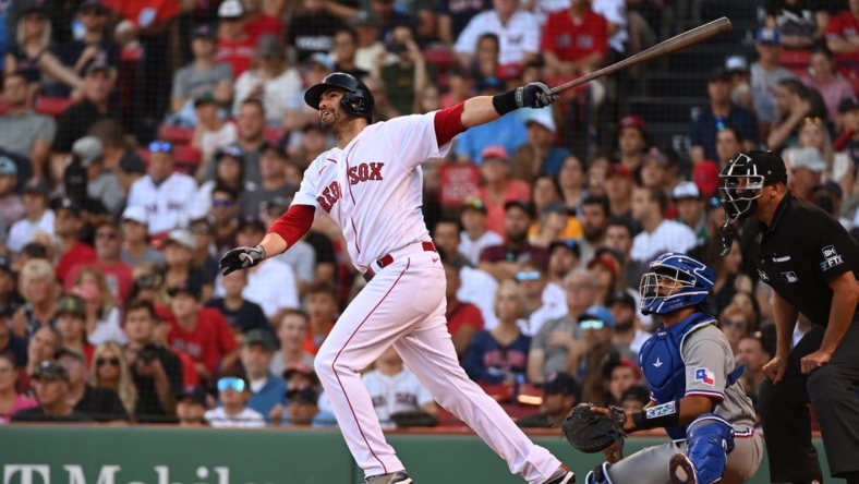 Sep 3, 2022; Boston, Massachusetts, USA; Boston Red Sox designated hitter J.D. Martinez (28) hits an RBI double against the Texas Rangers at Fenway Park. Mandatory Credit: Eric Canha-USA TODAY Sports