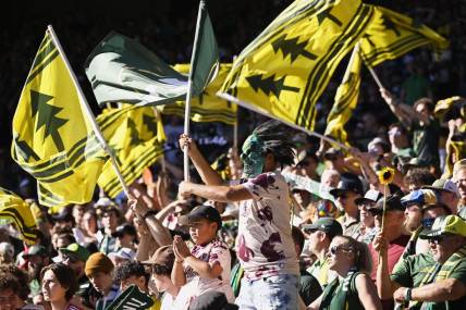 Sep 4, 2022; Portland, Oregon, USA;  Portland Timbers fans cheer for the home team during the second half against Atlanta United at Providence Park. The Timbers won 2-1. Mandatory Credit: Troy Wayrynen-USA TODAY Sports