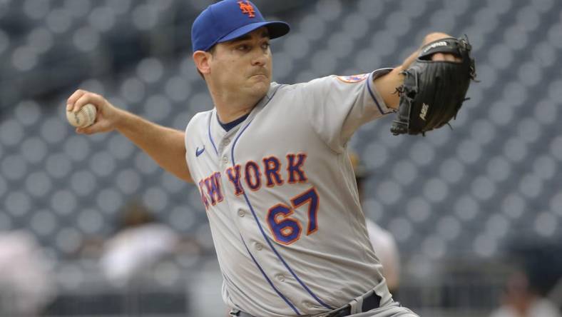 Sep 7, 2022; Pittsburgh, Pennsylvania, USA;  New York Mets relief pitcher Seth Lugo (67) pitches against the Pittsburgh Pirates during the eighth inning at PNC Park. Mandatory Credit: Charles LeClaire-USA TODAY Sports