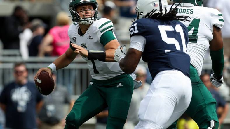 Sep 10, 2022; University Park, Pennsylvania, USA; Ohio Bobcats quarterback Kurtis Rourke (7) is pressured by Penn State Nittany Lions defensive tackle Hakeem Beamon (51) during the first quarter at Beaver Stadium. Mandatory Credit: Matthew OHaren-USA TODAY Sports