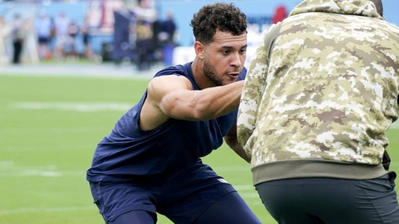 Sep 11, 2022; Nashville, Tennessee, USA; Tennessee Titans cornerback Caleb Farley (3) warms up before facing the New York Giants during their season opener at Nissan Stadium. Mandatory Credit: George Walker IV-USA TODAY Sports