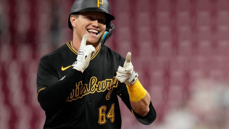 Pittsburgh Pirates designated hitter Diego Castillo (64) celebrates a two-run home run in the fifth inning of the MLB National League game between the Cincinnati Reds and the Pittsburgh Pirates at Great American Ball Park in downtown Cincinnati on Monday, Sept. 12, 2022. The Pirates led 6-2 in the top of the sixth inning.

Pittsburgh Pirates At Cincinnati Reds