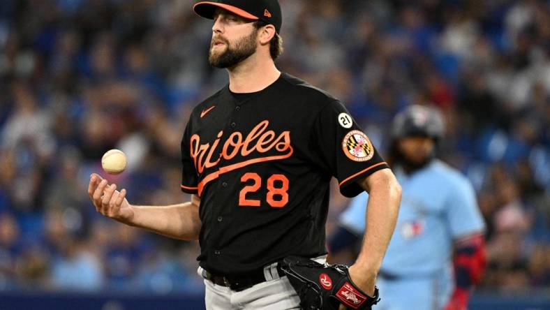 Sep 16, 2022; Toronto, Ontario, CAN;  Baltimore Orioles starting pitcher Jordan Lyles (28) in the first inning at Rogers Centre. Mandatory Credit: Dan Hamilton-USA TODAY Sports