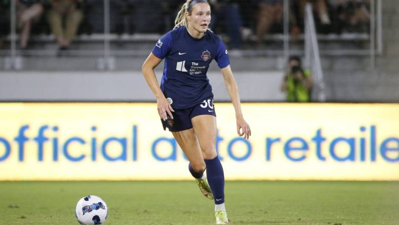 Sep 17, 2022; Washington, District of Columbia, USA; Washington Spirit defender Camryn Biegalski (30) looks to pass against New Jersey/New York Gotham FC in the first half at Audi Field. Mandatory Credit: Amber Searls-USA TODAY Sports