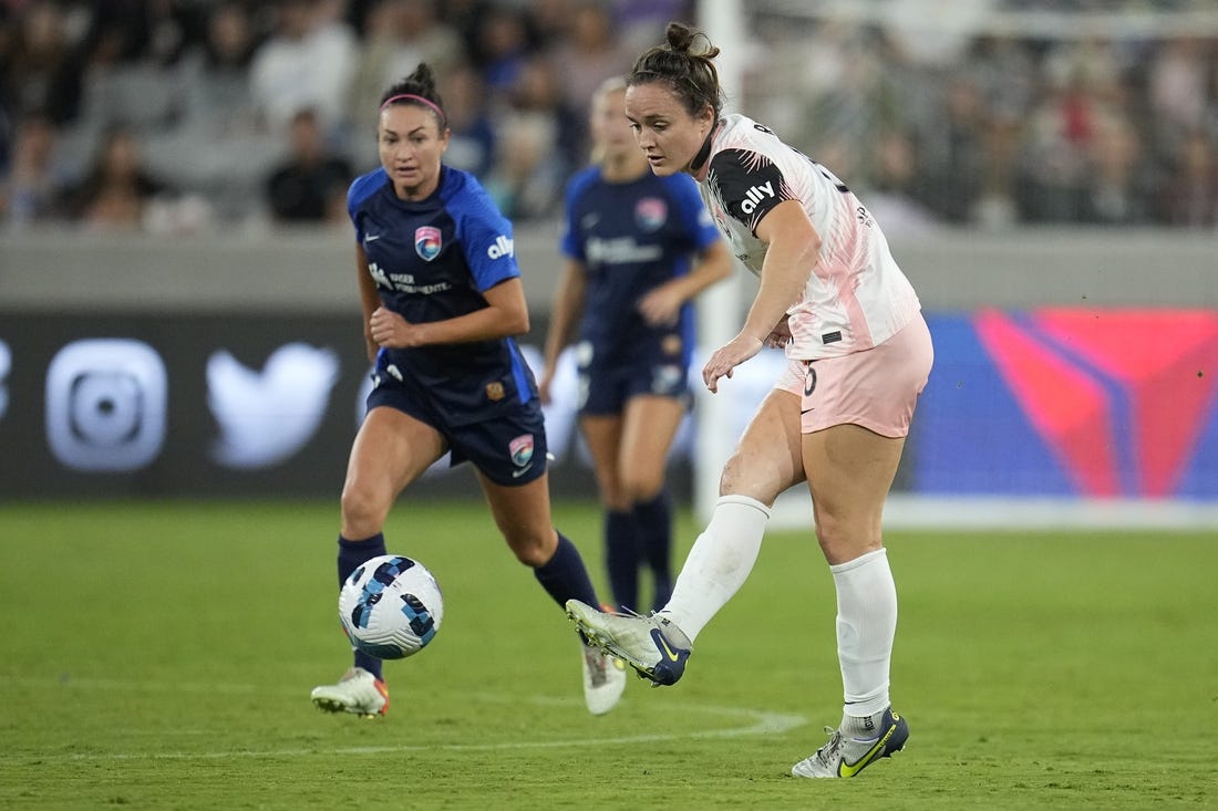 Sep 17, 2022; San Diego, California, USA; Angel City FC defender Megan Reid (6) attempts a pass against San Diego Wave FC in the second half at Snapdragon Stadium. Mandatory Credit: Ray Acevedo-USA TODAY Sports