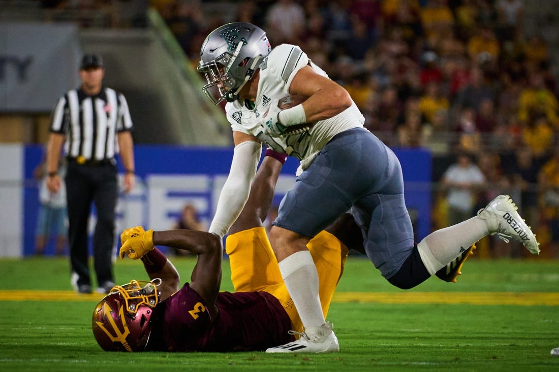 Sep 17, 2022; Tempe, Arizona, USA; Eastern Michigan Eagles running back Samson Evans (22) pushes Arizona State Sun Devils defensive back D.J. Taylor (3) down at Sun Devil Stadium in Tempe.

Football Asu Fb