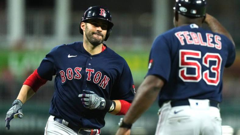 Boston Red Sox designated hitter J.D. Martinez (28) rounds the bases after hitting a home run in the fifth inning of a baseball game against the Cincinnati Reds, Tuesday, Sept. 20, 2022, at Great American Ball Park in Cincinnati.

Mlb Boston Red Sox At Cincinnati Reds Sept 20 0188