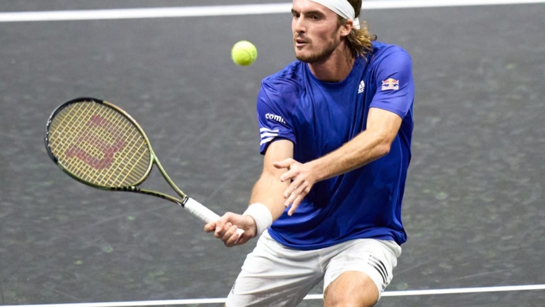 Sep 23, 2022; London, United Kingdom;  Stefanos Tsitsipas (GRE) plays a shot against Diego Schwartzman (ARG) in his Laver Cup Tennis match.  Mandatory Credit: Peter van den Berg-USA TODAY Sports
