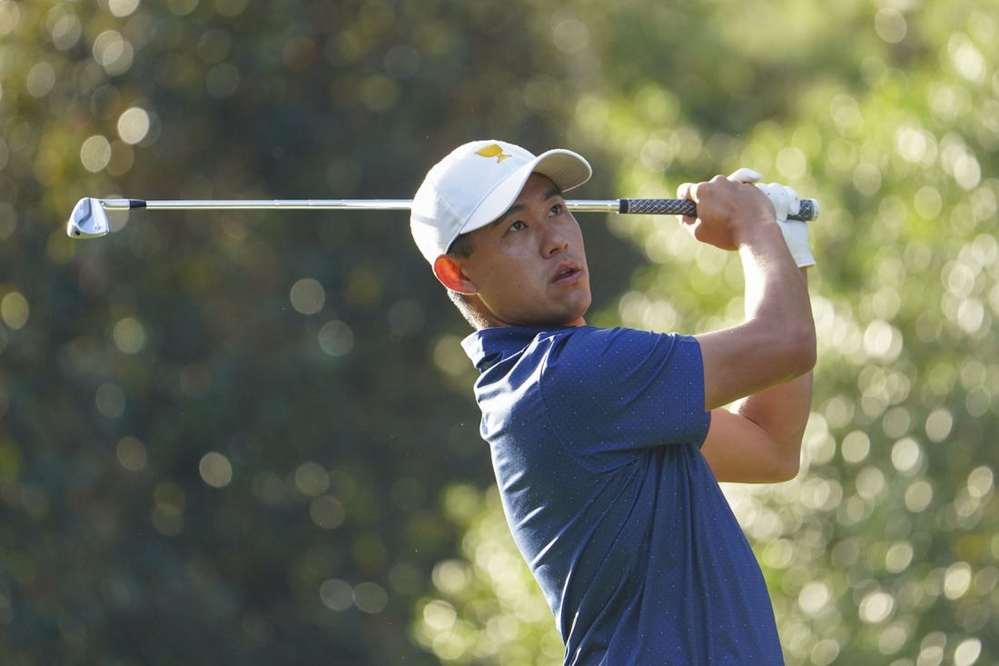 Sep 24, 2022; Charlotte, North Carolina, USA; Team USA golfer Collin Morikawa hits his tee shot on the sixth hole during the foursomes match play of the Presidents Cup golf tournament at Quail Hollow Club. Mandatory Credit: Peter Casey-USA TODAY Sports