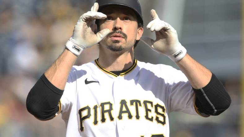 Sep 25, 2022; Pittsburgh, Pennsylvania, USA;  Pittsburgh Pirates center fielder Bryan Reynolds (10) reacts crossing home plate on a solo home run the Chicago Cubs during the sixth inning at PNC Park. Mandatory Credit: Charles LeClaire-USA TODAY Sports