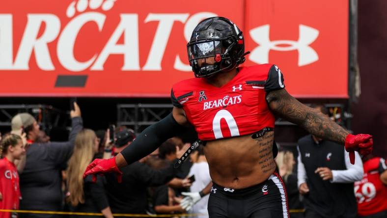 Sep 24, 2022; Cincinnati, Ohio, USA; Cincinnati Bearcats linebacker Ivan Pace Jr. (0) runs onto the field prior to the game against the Indiana Hoosiers at Nippert Stadium. Mandatory Credit: Katie Stratman-USA TODAY Sports