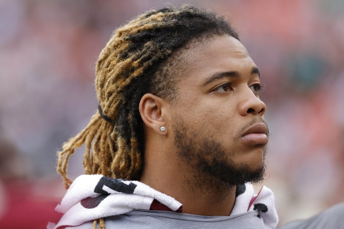 Sep 25, 2022; Landover, Maryland, USA; Injured Washington Commanders defensive end Chase Young  stands on the sidelines against the Philadelphia Eagles at FedExField. Mandatory Credit: Geoff Burke-USA TODAY Sports