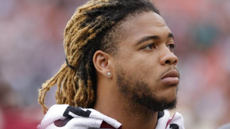 Sep 25, 2022; Landover, Maryland, USA; Injured Washington Commanders defensive end Chase Young  stands on the sidelines against the Philadelphia Eagles at FedExField. Mandatory Credit: Geoff Burke-USA TODAY Sports