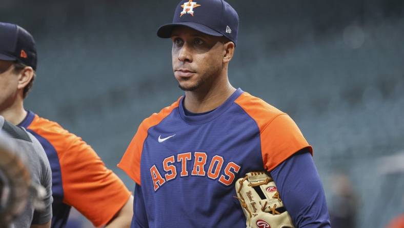 Oct 1, 2022; Houston, Texas, USA; Houston Astros outfielder Michael Brantley watches during batting practice before the game against the Tampa Bay Rays at Minute Maid Park. Mandatory Credit: Troy Taormina-USA TODAY Sports