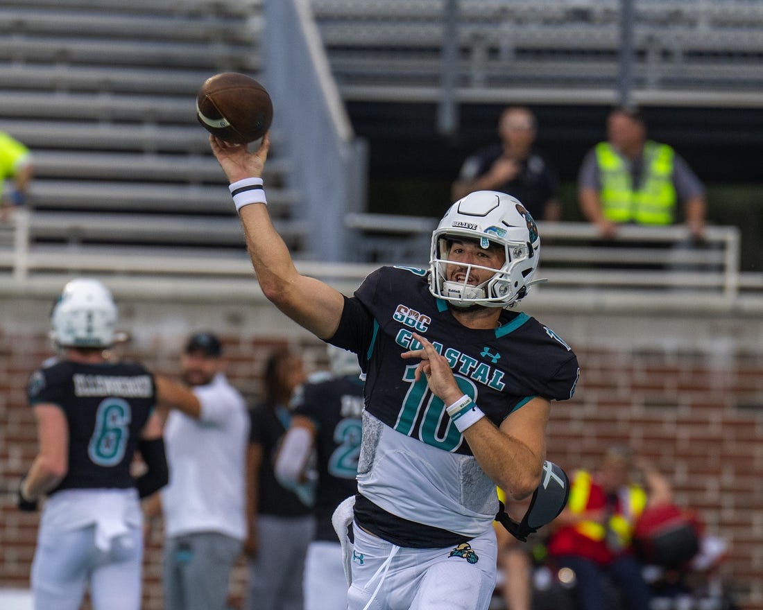 Oct 1, 2022; Conway, South Carolina, USA; Coastal Carolina Chanticleers quarterback Grayson McCall (10) throw a pass warmups prior to a game against the Georgia Southern Eagles at Brooks Stadium. Mandatory Credit: David Yeazell-USA TODAY Sports