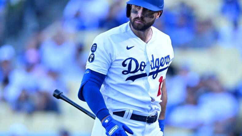 Oct 2, 2022; Los Angeles, California, USA; Los Angeles Dodgers right fielder Joey Gallo (12) walks back to the dugout after striking out in the ninth inning against the Colorado Rockies at Dodger Stadium. Mandatory Credit: Jayne Kamin-Oncea-USA TODAY Sports