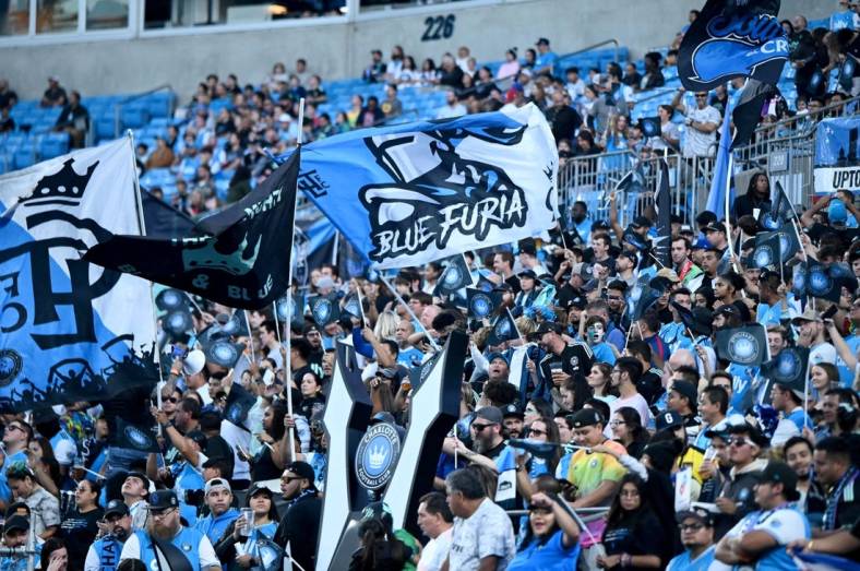 Oct 5, 2022; Charlotte, North Carolina, USA; Charlotte FC fans cheer before a game against the Columbus Crew at Bank of America Stadium. Mandatory Credit: Griffin Zetterberg-USA TODAY Sports
