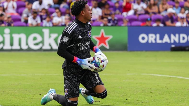 Oct 9, 2022; Orlando, Florida, USA; Orlando City goalkeeper Pedro Gallese (1) makes a save during the first half against the Columbus Crew at Exploria Stadium. Mandatory Credit: Mike Watters-USA TODAY Sports