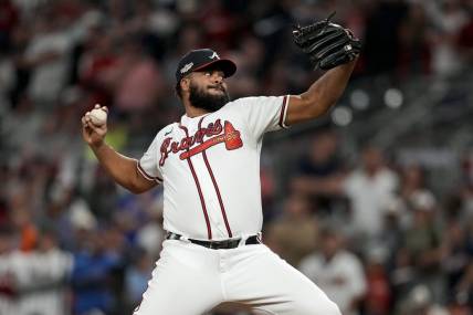 Oct 12, 2022; Atlanta, Georgia, USA; Atlanta Braves relief pitcher Kenley Jansen (74) throws against the Philadelphia Phillies in the ninth inning during game two of the NLDS for the 2022 MLB Playoffs at Truist Park. Mandatory Credit: Dale Zanine-USA TODAY Sports
