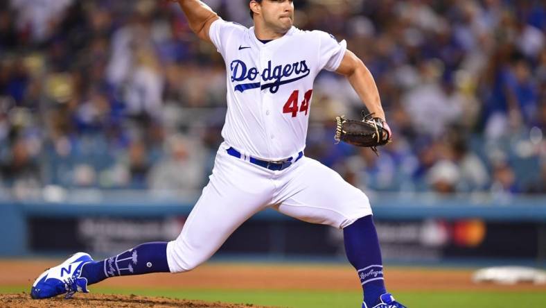 Oct 12, 2022; Los Angeles, California, USA; Los Angeles Dodgers relief pitcher Tommy Kahnle (44) throws during the ninth inning of game two of the NLDS for the 2022 MLB Playoffs against the San Diego Padres at Dodger Stadium. Mandatory Credit: Gary A. Vasquez-USA TODAY Sports