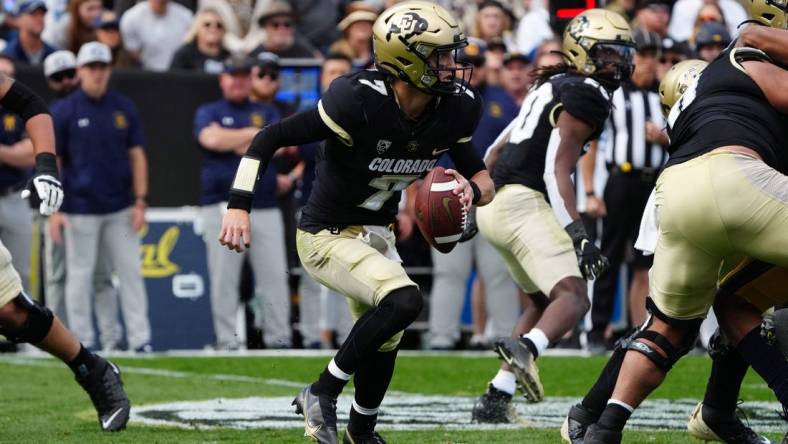 Oct 15, 2022; Boulder, Colorado, USA; Colorado Buffaloes quarterback Owen McCown (7) scrambles in the second quarter against the California Golden Bears at Folsom Field. Mandatory Credit: Ron Chenoy-USA TODAY Sports