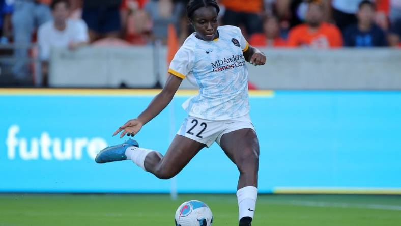 Oct 16, 2022; Houston, Texas, USA; Houston Dash forward Michelle Alozie (22) handles the ball during the second half against the Kansas City Current at PNC Stadium. Mandatory Credit: Erik Williams-USA TODAY Sports