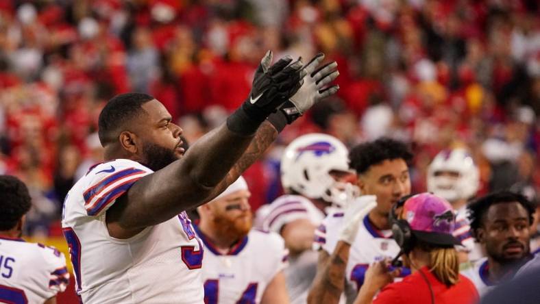 Oct 16, 2022; Kansas City, Missouri, USA; Buffalo Bills defensive tackle Jordan Phillips (97) celebrates toward fans against the Kansas City Chiefs during the second half at GEHA Field at Arrowhead Stadium. Mandatory Credit: Denny Medley-USA TODAY Sports