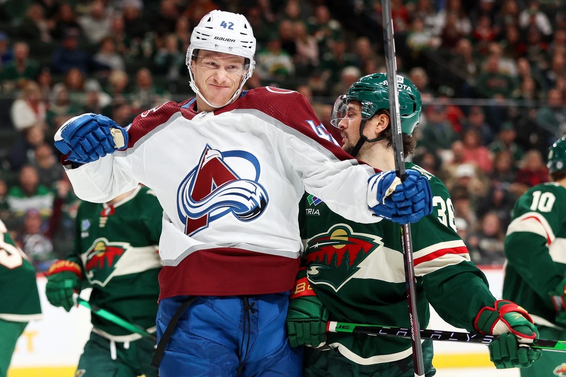 Oct 17, 2022; Saint Paul, Minnesota, USA; Colorado Avalanche defenseman Josh Manson (42) celebrates his goal during the third period against the Minnesota Wild at Xcel Energy Center. Mandatory Credit: Matt Krohn-USA TODAY Sports