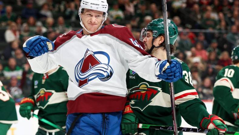 Oct 17, 2022; Saint Paul, Minnesota, USA; Colorado Avalanche defenseman Josh Manson (42) celebrates his goal during the third period against the Minnesota Wild at Xcel Energy Center. Mandatory Credit: Matt Krohn-USA TODAY Sports