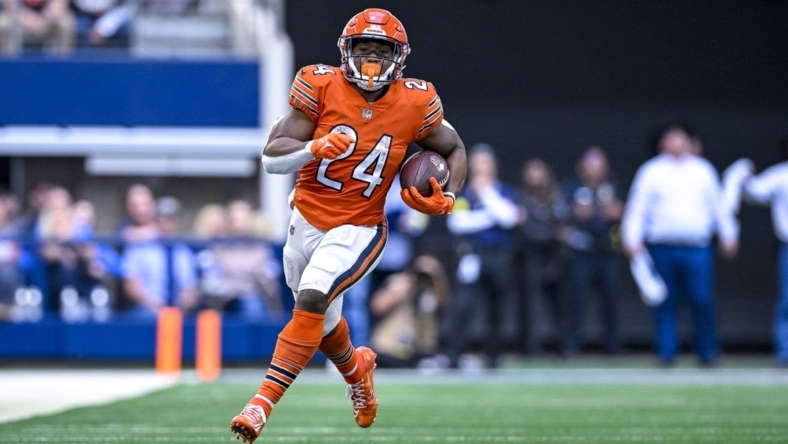 Oct 30, 2022; Arlington, Texas, USA; Chicago Bears running back Khalil Herbert (24) runs for a first down against the Dallas Cowboys during the second half at AT&T Stadium. Mandatory Credit: Jerome Miron-USA TODAY Sports