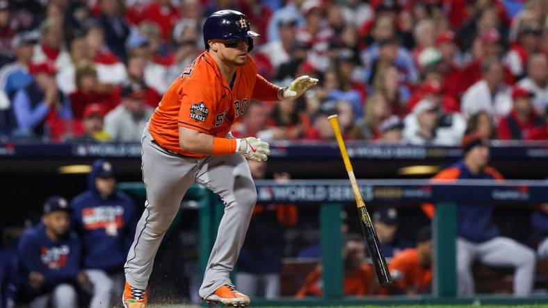 Nov 2, 2022; Philadelphia, Pennsylvania, USA; Houston Astros catcher Christian Vazquez (9) hits a single against the Philadelphia Phillies during the fourth inning in game four of the 2022 World Series at Citizens Bank Park. Mandatory Credit: Bill Streicher-USA TODAY Sports