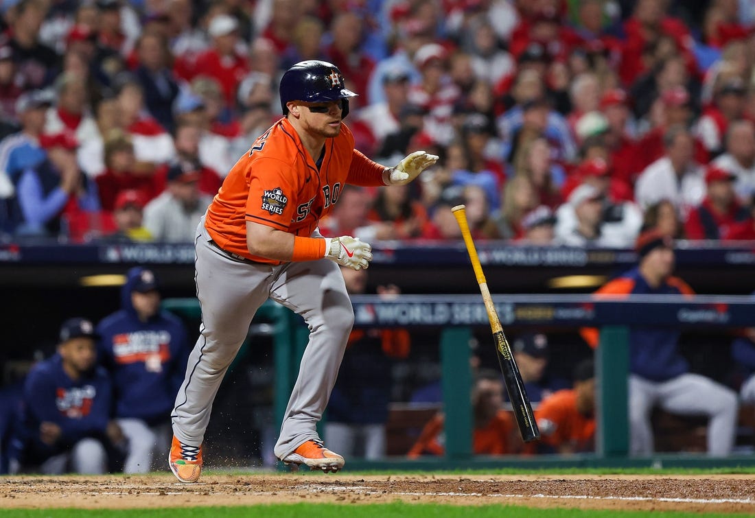 Nov 2, 2022; Philadelphia, Pennsylvania, USA; Houston Astros catcher Christian Vazquez (9) hits a single against the Philadelphia Phillies during the fourth inning in game four of the 2022 World Series at Citizens Bank Park. Mandatory Credit: Bill Streicher-USA TODAY Sports