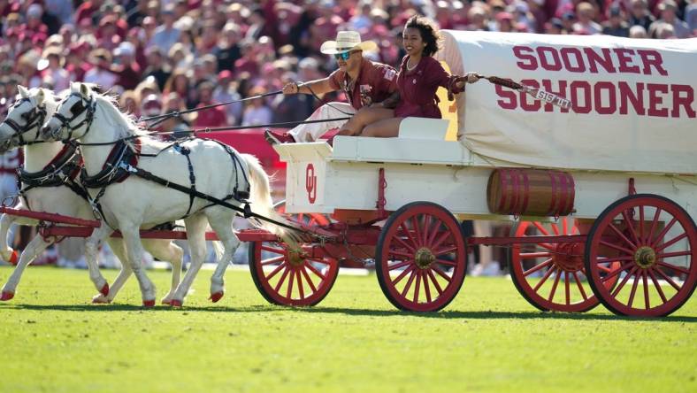 Nov 5, 2022; Norman, Oklahoma, USA; The Sooner Schooner enters the field after Oklahoma Sooners score a touchdown against the Baylor Bears during the first half at Gaylord Family-Oklahoma Memorial Stadium. Mandatory Credit: Chris Jones-USA TODAY Sports