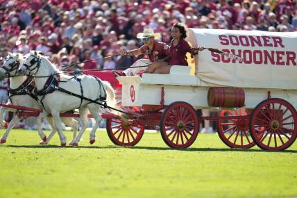 Nov 5, 2022; Norman, Oklahoma, USA; The Sooner Schooner enters the field after Oklahoma Sooners score a touchdown against the Baylor Bears during the first half at Gaylord Family-Oklahoma Memorial Stadium. Mandatory Credit: Chris Jones-USA TODAY Sports