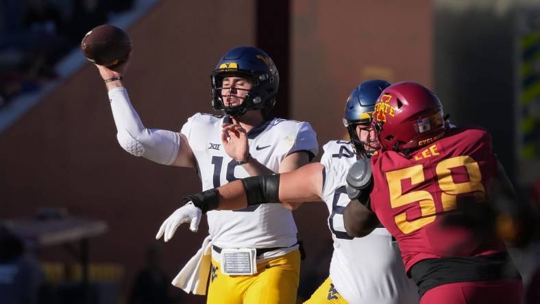 West Virginia quarterback JT Daniels throws a pass in the second quarter against Iowa State during a NCAA football game at Jack Trice Stadium in Ames on Saturday, Nov. 5, 2022.

Iowastatevswvu 202201105 Bh